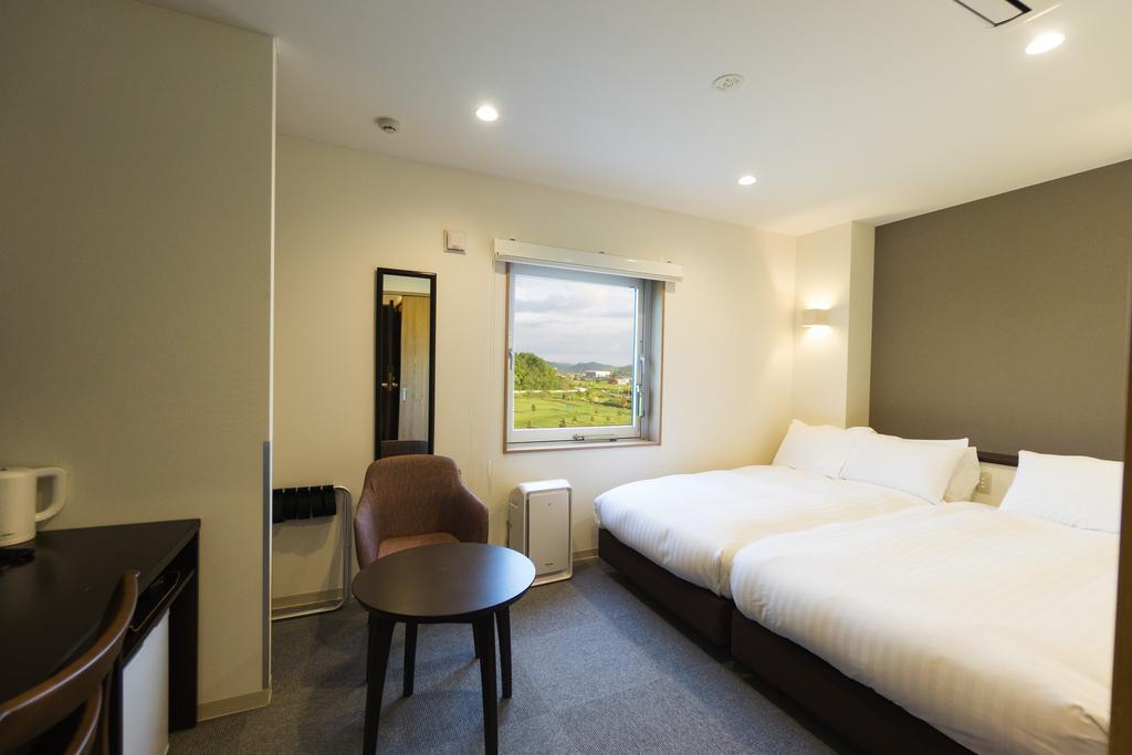 Mikasa Tennen Onsen Taikonoyu Sparesort Hotel Taiko Bettei Hatago Iwamizawa Extérieur photo